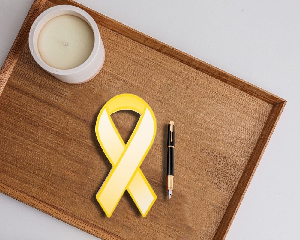 Gold Ribbon Paper Donation Ribbons (50/Pack)