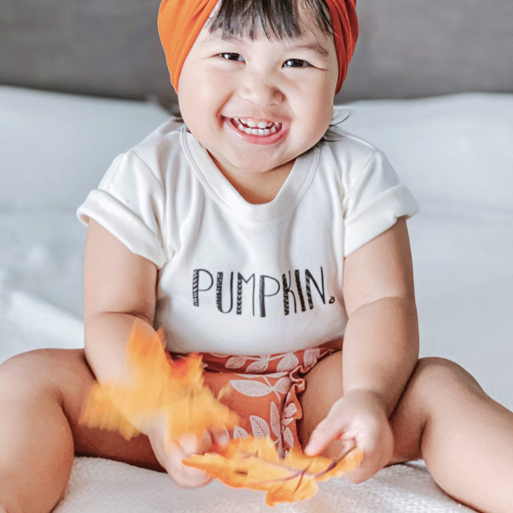 graphic bodysuit | pumpkin